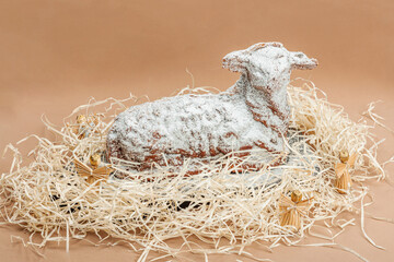 Christmas lamb cake with traditional New Year decor. Baked sweet dessert with sugar icing