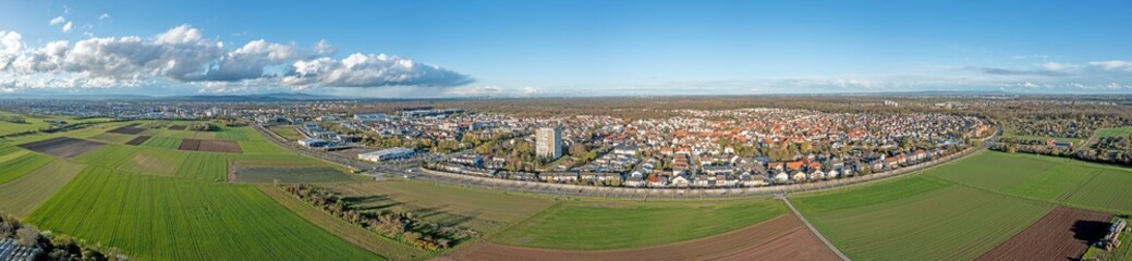 Aerial panoramic view of German settlement Koenigstaedten near Ruesselsheim on a sunny day