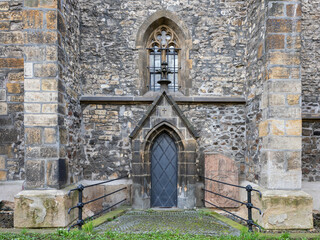 The old wooden door of the church. Rear entrance.