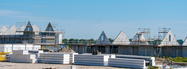 Modern Family Homes Under Construction in Dutch Suburban Area