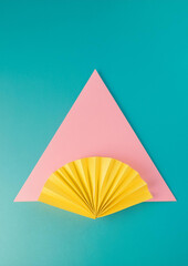 Paper Fan on a colourful background 