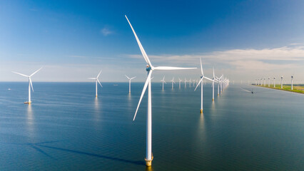 Wind Turbines Generating Renewable Energy Off The Coast Of The Netherlands