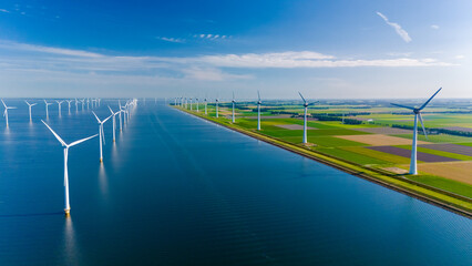 Harnessing Wind Energy: Turbines Line The Dutch Coast Against A Vibrant Sky