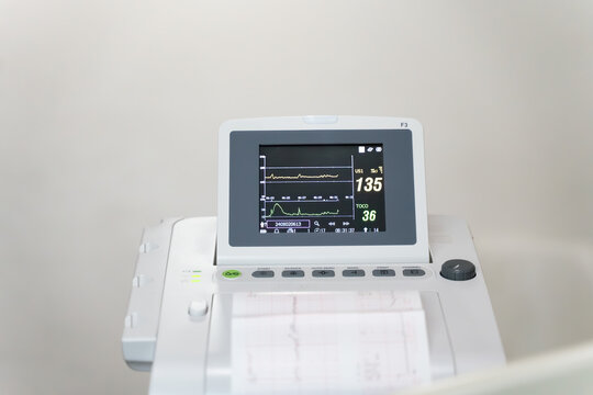 Fetal heart rate monitor on hospital, Doctor Measuring the heart rate of the fetus.