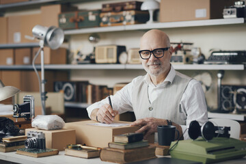 Seller writing the address on a delivery box