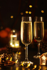 Two glasses with champagne in New Year Eve and Christmas style	