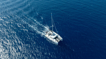 The beauty of a catamaran cruising, seen from above.