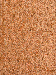 Flax seed background, brown flaxseeds, linseed texture, top view