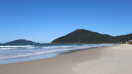 A sunny day at  Lagoinha da Ponta das Canas beach, Florian&oacute;polis, Santa Catarina, Brazil.