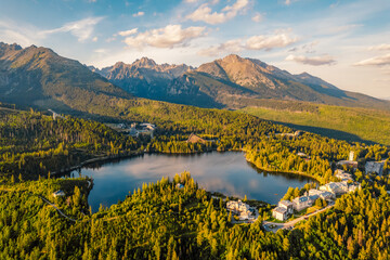 Fototapeta premium Mountain lake Strbske pleso. Strbske lake with view of the High Tatras National Park, Slovakia