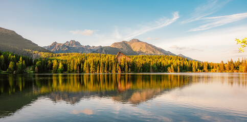 Mountain lake Strbske pleso. Strbske lake with view of the High Tatras National Park, Slovakia
