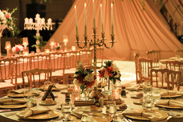 Opulent Wedding Reception Table Decor with Candelabra, Flowers, and Elegant Settings