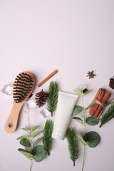 Organic Skincare Dropper Bottles and Wooden Brush Mockup with Natural Elements