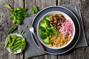 quinoa with veggies and mushrooms in a bowl