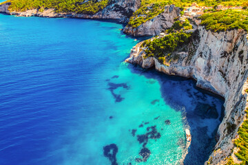 Fototapeta premium Blue caves on Zakynthos island or Zante Island, Greece. Beautiful views of azure sea water and nature with cliffs cave