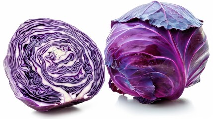 Obraz premium A whole purple cabbage and a cross-section slice, revealing intricate patterns against a white background. 