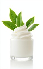 Fresh cream topped with green leaves in a glass jar, perfect for beauty, culinary, or wellness themes.