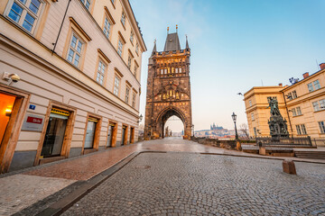 View of the city of Prague with Old Town Bridge Tower on  Charles bridge  in Prague, Czech Republic.