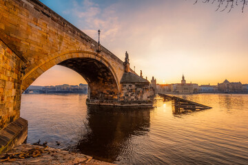 Fototapeta premium View of the city of Prague and the Vltava river with Old Town Bridge Tower on Charles bridge in Prague, Czech Republic.