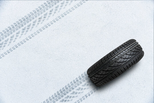 Winter road covered snow and tracks of сar tires marks