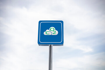 A CO2 sign concept illustrating how rising carbon dioxide levels contribute to the increasing heat...