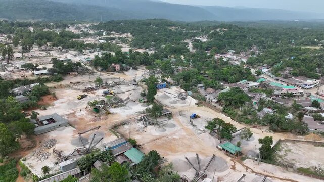 Pick up stones from the Ground Area,Winding Roads and Verdant Fields Aerial view of Rural Beauty