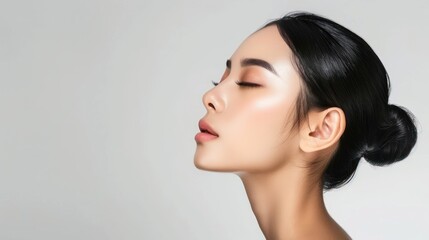 Fototapeta premium Close-up Profile Portrait of a Woman with Eyes Closed