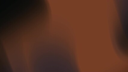 Brown blurred background with fading edges, suitable for adding text or graphics with a focus on darker shades and a dramatic effect.