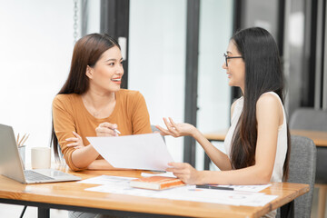 Fototapeta premium Business group Talk and consult to find solutions to work problems in the company.