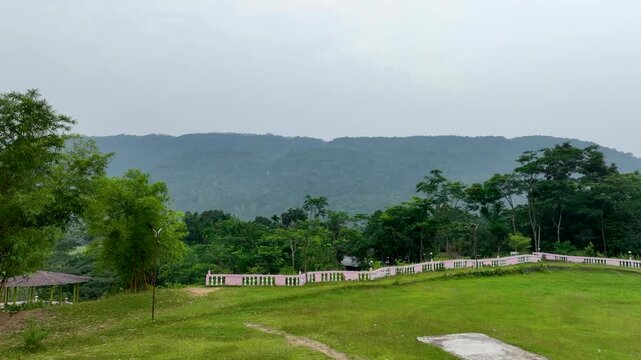 Stunning Aerial View of Misty Mountain Valley and Green Fields