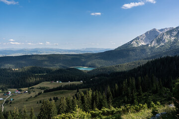 Majestic summer day in the Durmitor National park. Village Zabljak, Montenegro, Balkans, Europe. Scenic image of popular travel destination. Discover the beauty of earth. Hiking nature destination
