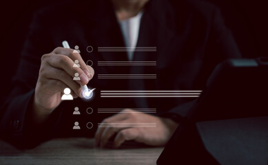 Human Resource Management (HR) concept: a businessman uses an interface for recruitment, leadership...