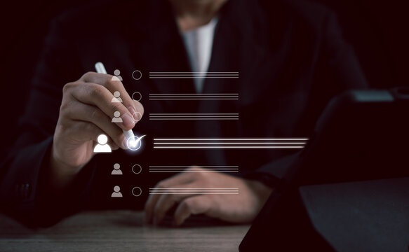 Human Resource Management (HR) concept: a businessman uses an interface for recruitment, leadership development, strategic customer targeting, company positions with precision and efficiency.