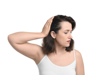 Obraz premium Woman with hair loss problem on white background