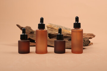 Amber Glass Bottles with Wooden Background Template