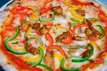 pizza with meat and peppers, selective focus