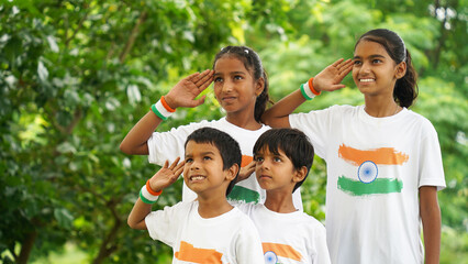 Group of happy Indian holding indian tricolour flag celebrating Independence day or Republic day.