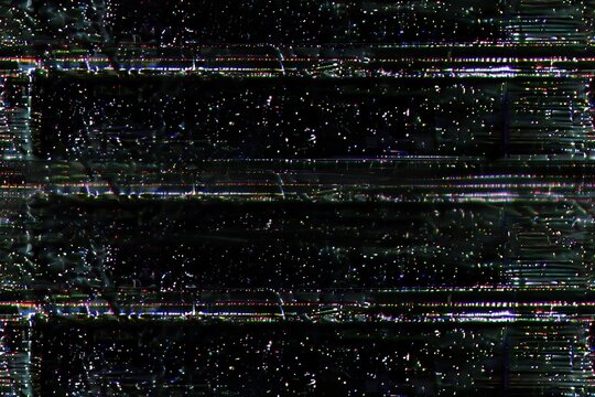 Abstract background composed of dark green, black, and purple VHS noise.