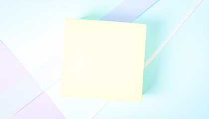Blank Yellow Paper on Pastel Blue Background