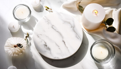 White marble tray with candles and white fabric