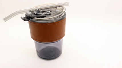 Tumbler in the form of a glass or glass mug with a modern design