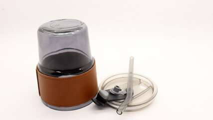 Tumbler in the form of a glass or glass mug with a modern design