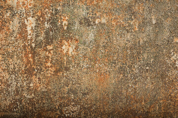 Old rusty iron sheet with small pieces of peeling and faded paint. Background. Grunge.