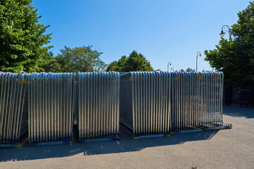 Temporary fencing. Security. Mass event. A large crowd of people. Portable sectional fence. Steel...
