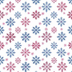 A seamless pattern featuring blue and red snowflakes on a white background.
