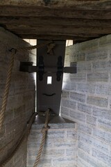 Old Ladoga, Russia, July 8, 2024. An embrasure in the fortress wall, covered by a shield.                               