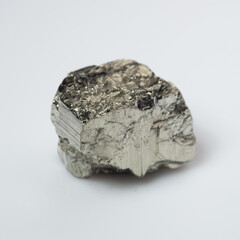 natural silver pyrite gem on the white background