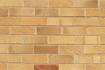 Real yellow toned brick wall