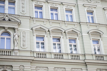 facade of a building, house with windows, old european architecture