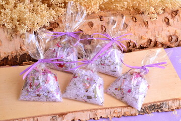 Small gift wedding favors bags scented sachets with purple color bath salts, guest souvenirs spring...